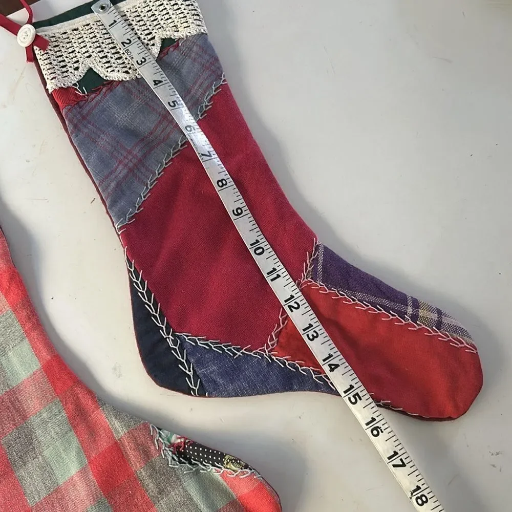 Two vintage handmade embroidered patchwork Christmas stockings